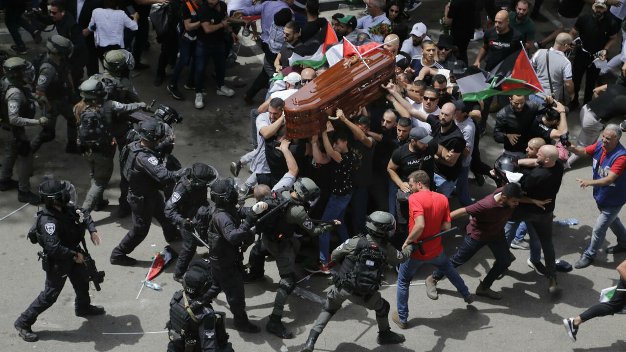 International outcry after Israeli police charge at funeral of Shireen Abu Akleh